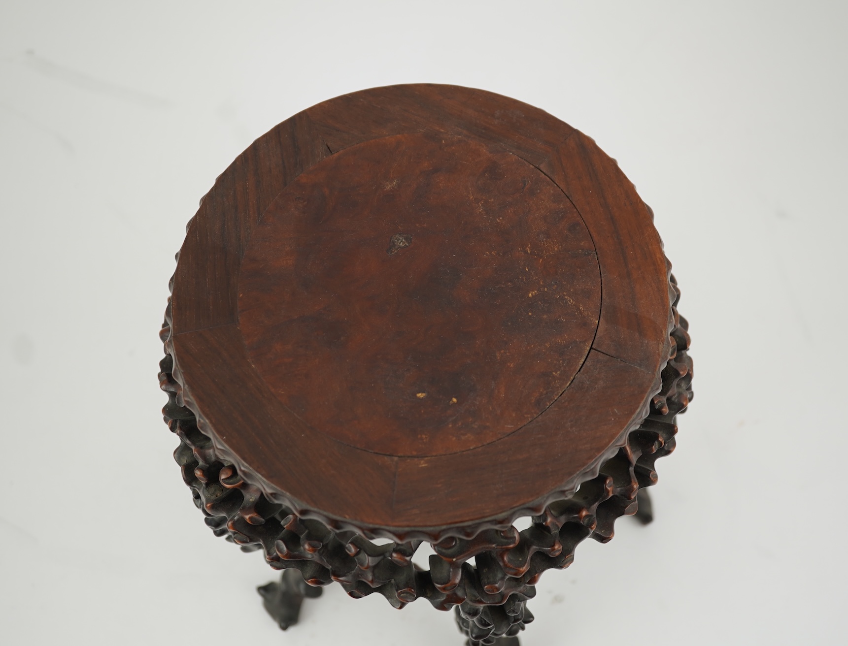 A Chinese hardwood scholar’s stand, carved in imitation of rootwood, early 20th century